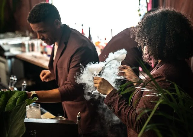 Marriott bartenders mixing cocktails for guests at Tales of the Cocktail in New Orleans