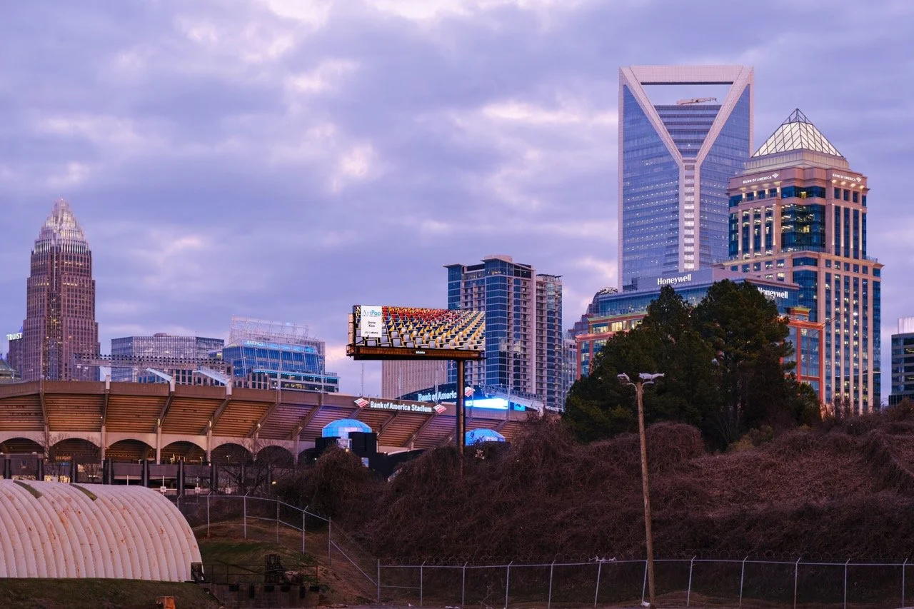 ArtPop Street Gallery Cities Program Class of 2024 Adams Digital Billboard Charlotte NC Skyline Dusk Jinna Kim.jpeg