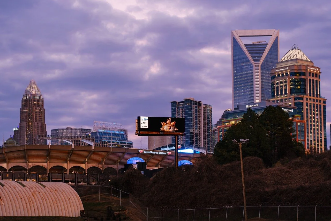 ArtPop Street Gallery Cities Program Class of 2024 Adams Digital Billboard Charlotte NC Skyline Dusk Aba Hutchison.jpeg