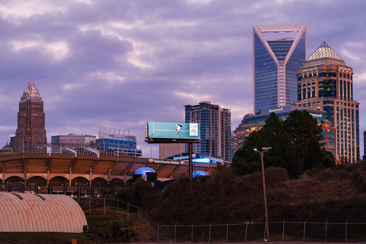 ArtPop Street Gallery Cities Program Class of 2024 Adams Digital Billboard Charlotte NC Skyline Dusk Rico Marcelo.jpeg