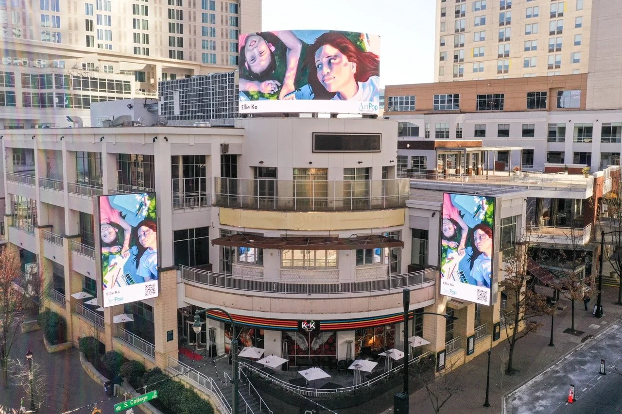 ArtPop Street Gallery Cities Program Class of 2025 Orange Barrel Media Uptown Charlotte Queen City Quarter Digital Display Ellie Ko Student Artist.jpeg
