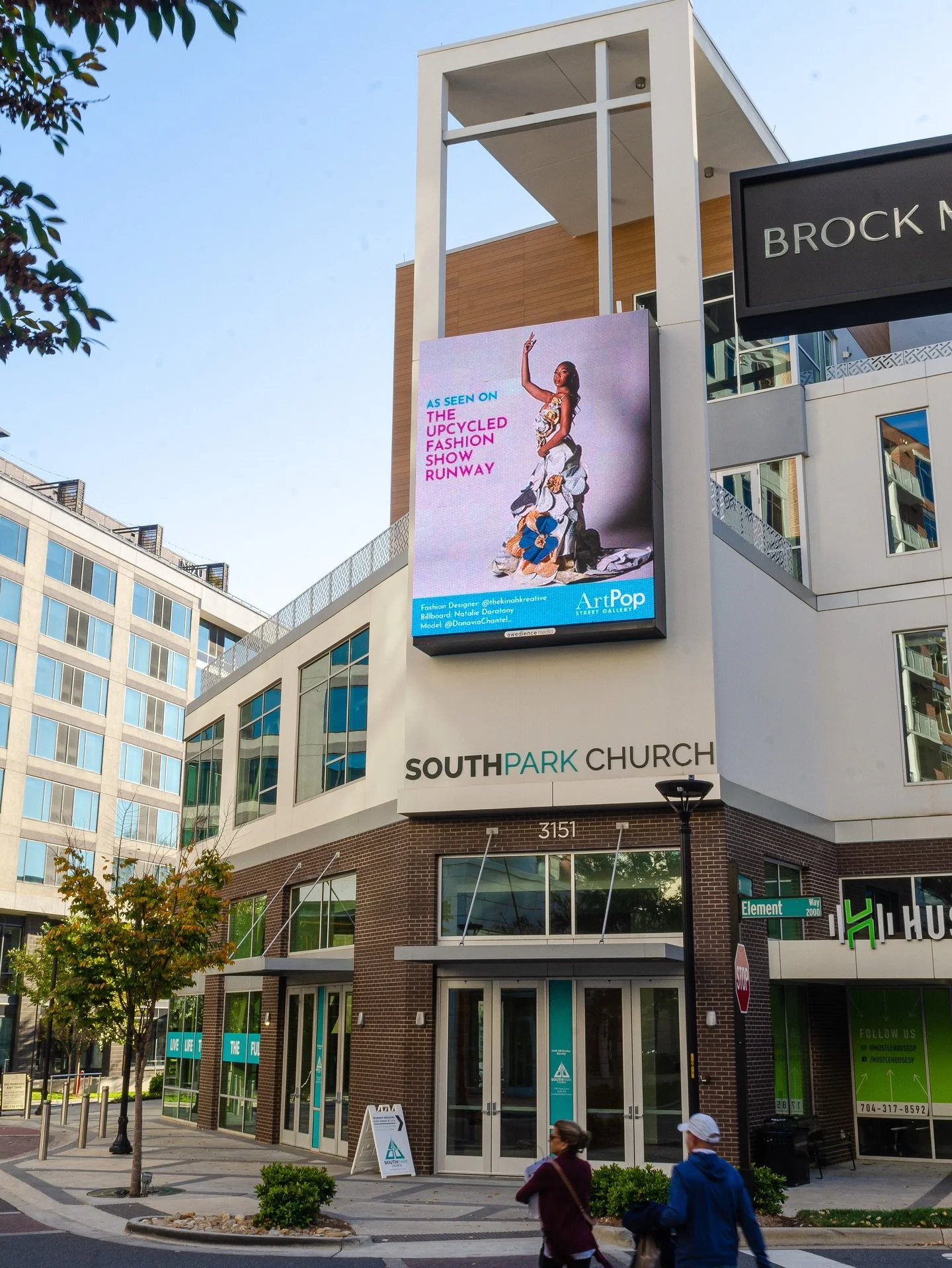 All 15 Upcycled Fashion Show designers now have their looks and models featured on gorgeous digital billboards across Charlotte , courtesy of @awedience_media 
Their full-color displays are currently running at @apexsouthpark , @promenadeonprovidence