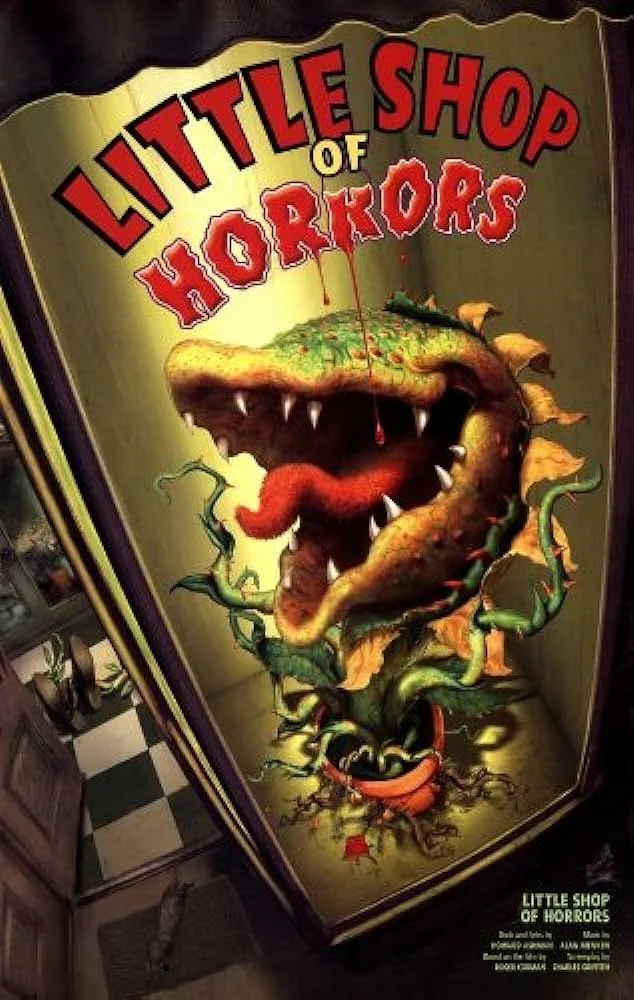 Poster for Little Shop of Horrors featuring a large, cartoonish plant with a mouth full of sharp teeth, vines, and a red tongue, with the title in red and yellow letters.