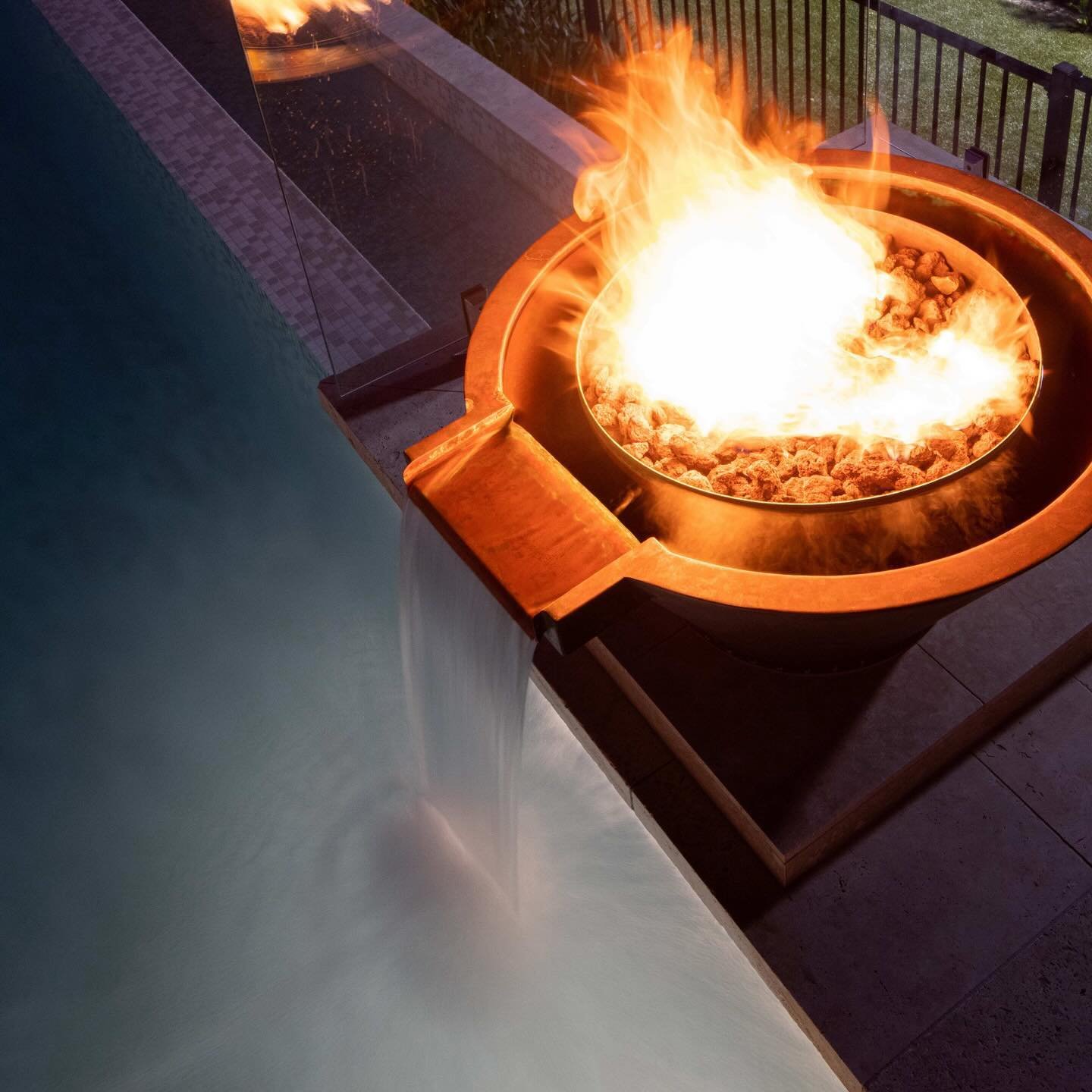 Looking for some stylish inspiration for outdoor warmth? Check out these beautiful copper fire bowls installed poolside in this acreage design. 
.
Outdoor living design by @fluidlandscapedesign 
Construction by @jakin_luxury_living 
.
#fire #firebowl