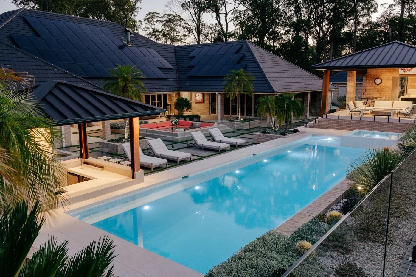 Designed to be enjoyed from sunrise swims to fireside nights.
Layered outdoor zones, integrated lighting and a strong connection to the surrounding landscape make this acreage property feel like a five-star retreat, every day. 

Designed by @fluidlan