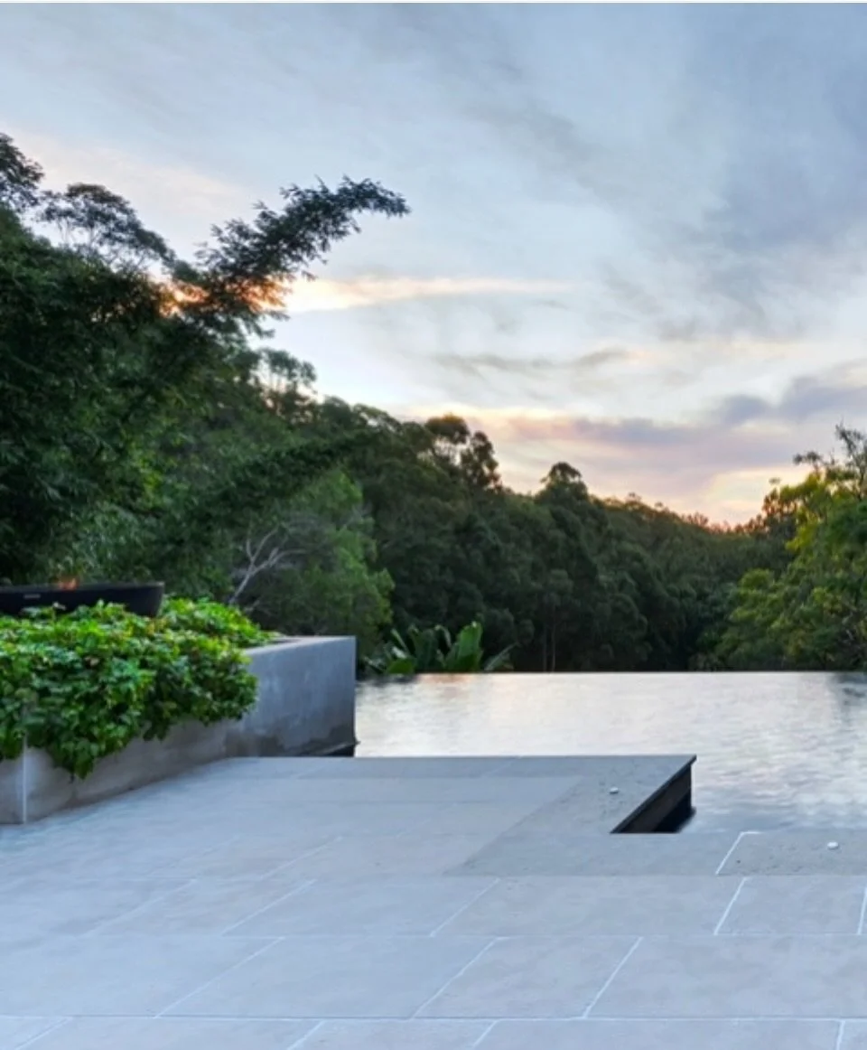 A little slice of resort living at home. 

Lush planting, natural textures and an infinity-edge pool come together to create a space that feels calm, private and completely connected to its surroundings.

The kind of backyard that makes you want to s