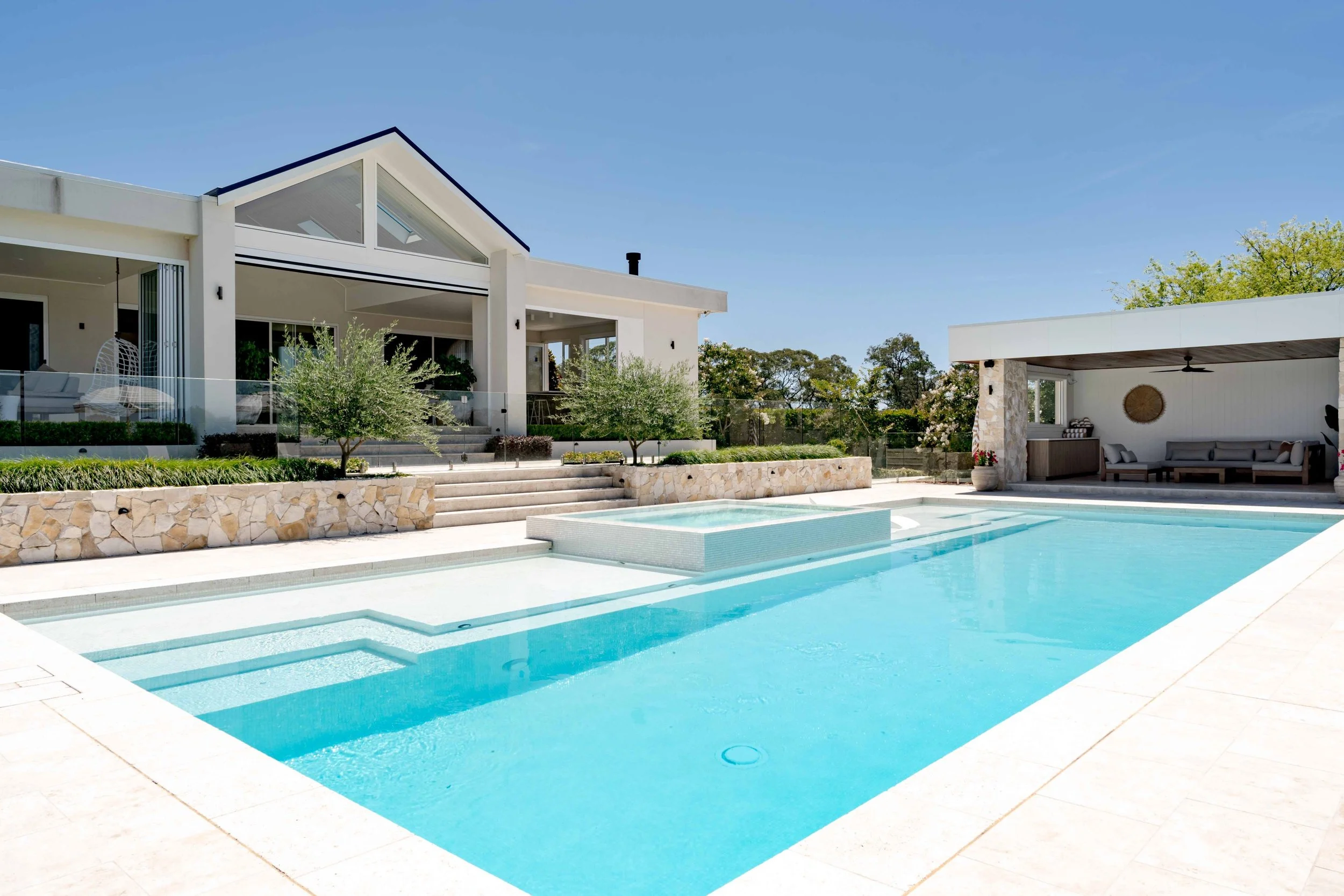 Sun drenched pool and surrounds