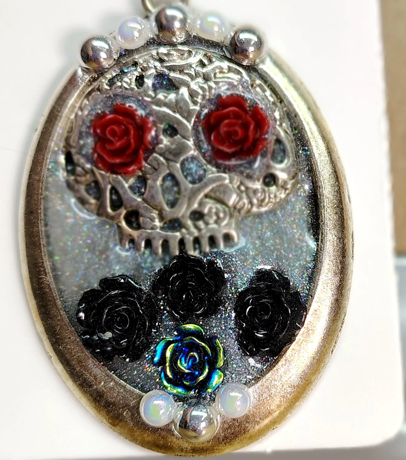 HalfSkullAndRosesNecklaceCloseup.jpg