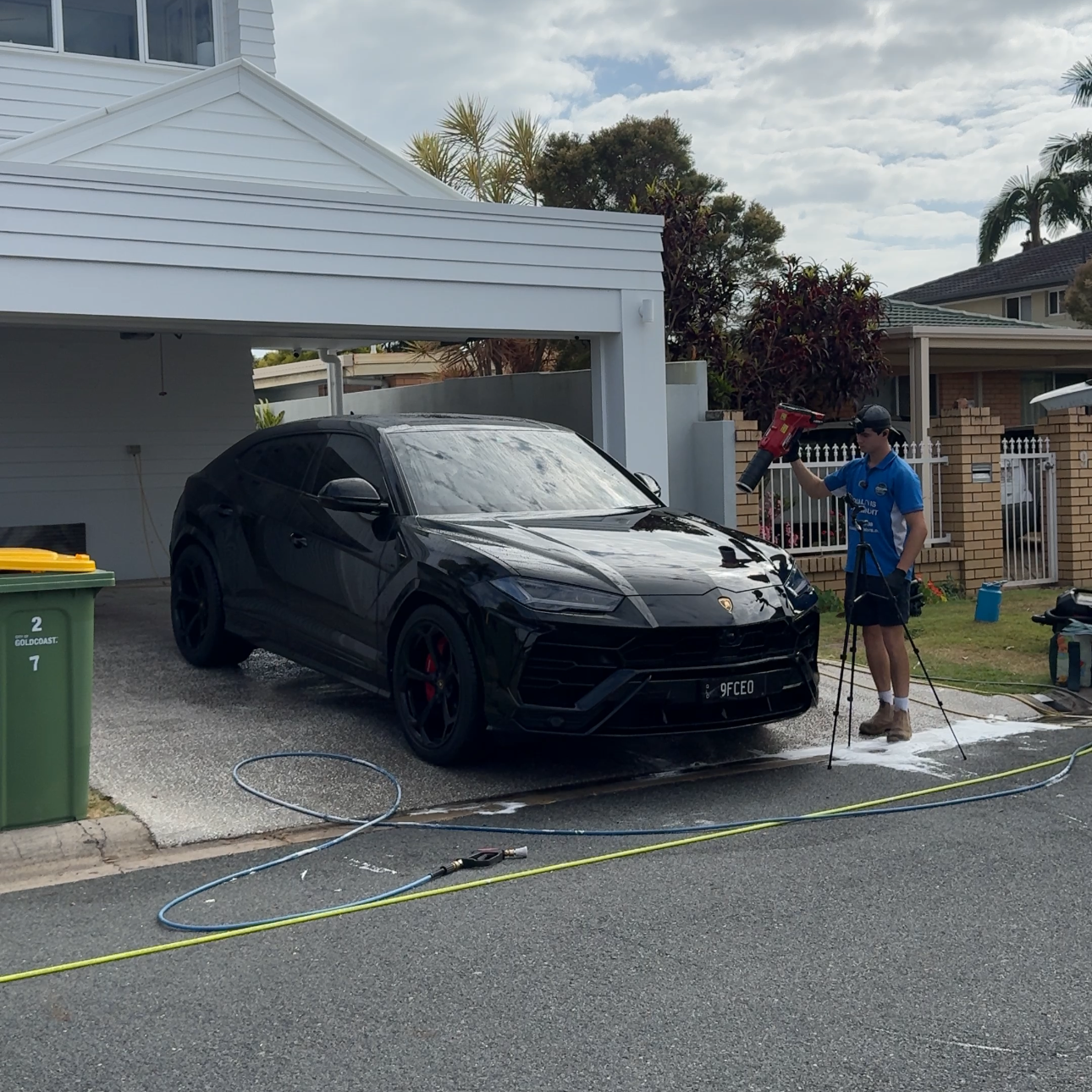 The Auto Detailers Blow Drying a Lamborghini Urus as part of a Maintenance Detail