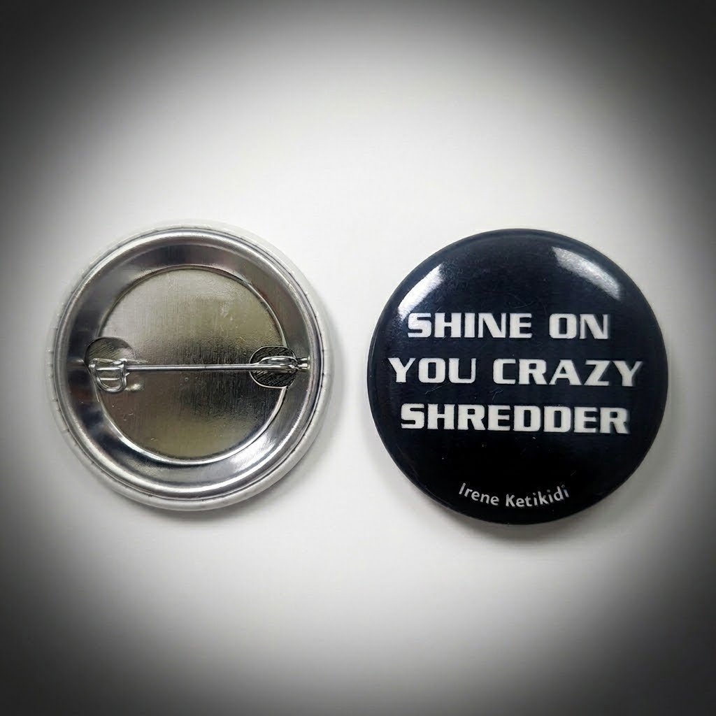 Glow-in-the-dark "Crazy Shredder" Pin Buttons (with case)