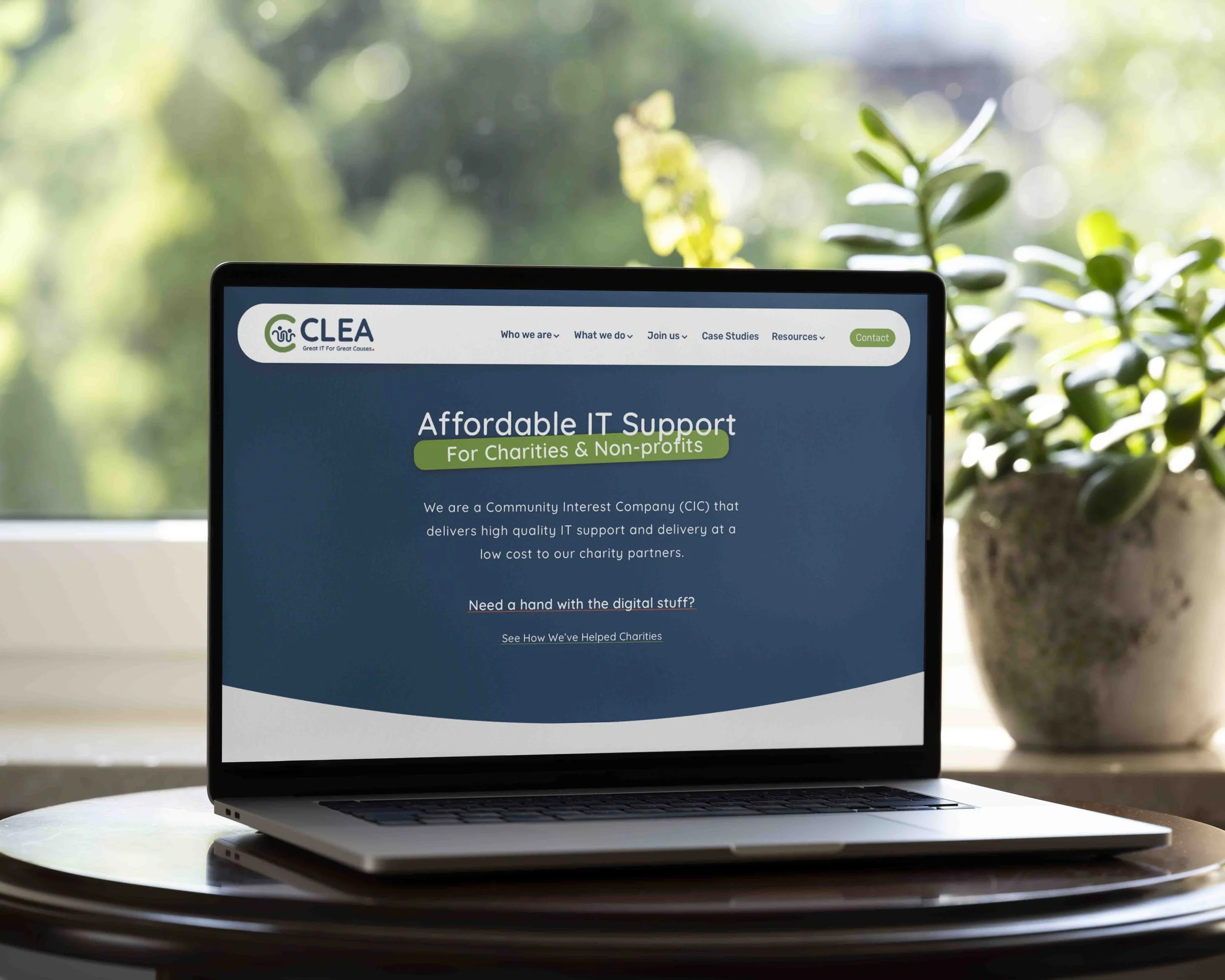 Screenshot of a website homepage for CLEA, a community interest company providing affordable IT support for charities and non-profits, with sections about digital gap challenges faced by UK charities.