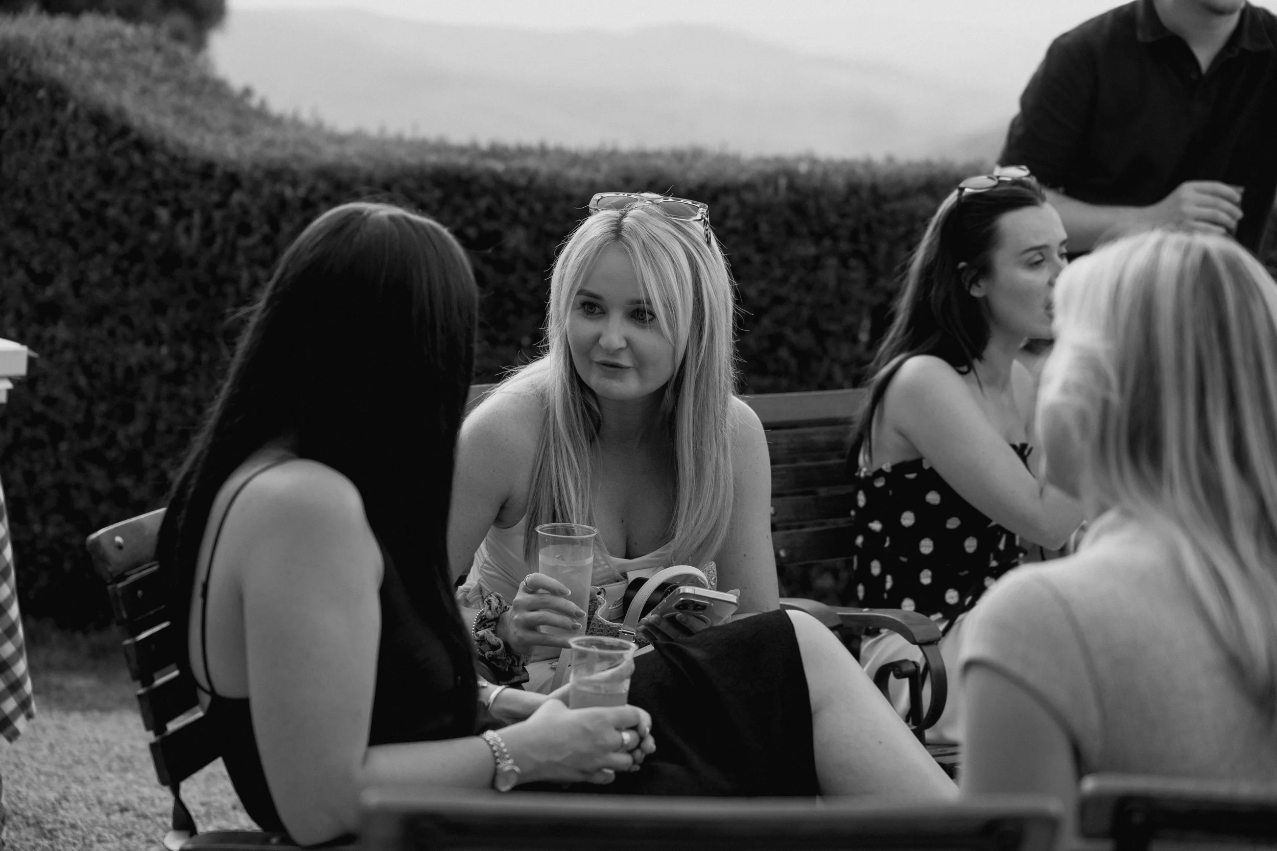 Bride and guests enjoying a pizza welcome party at Borgo di Pietrafitta in Tuscany, Italy