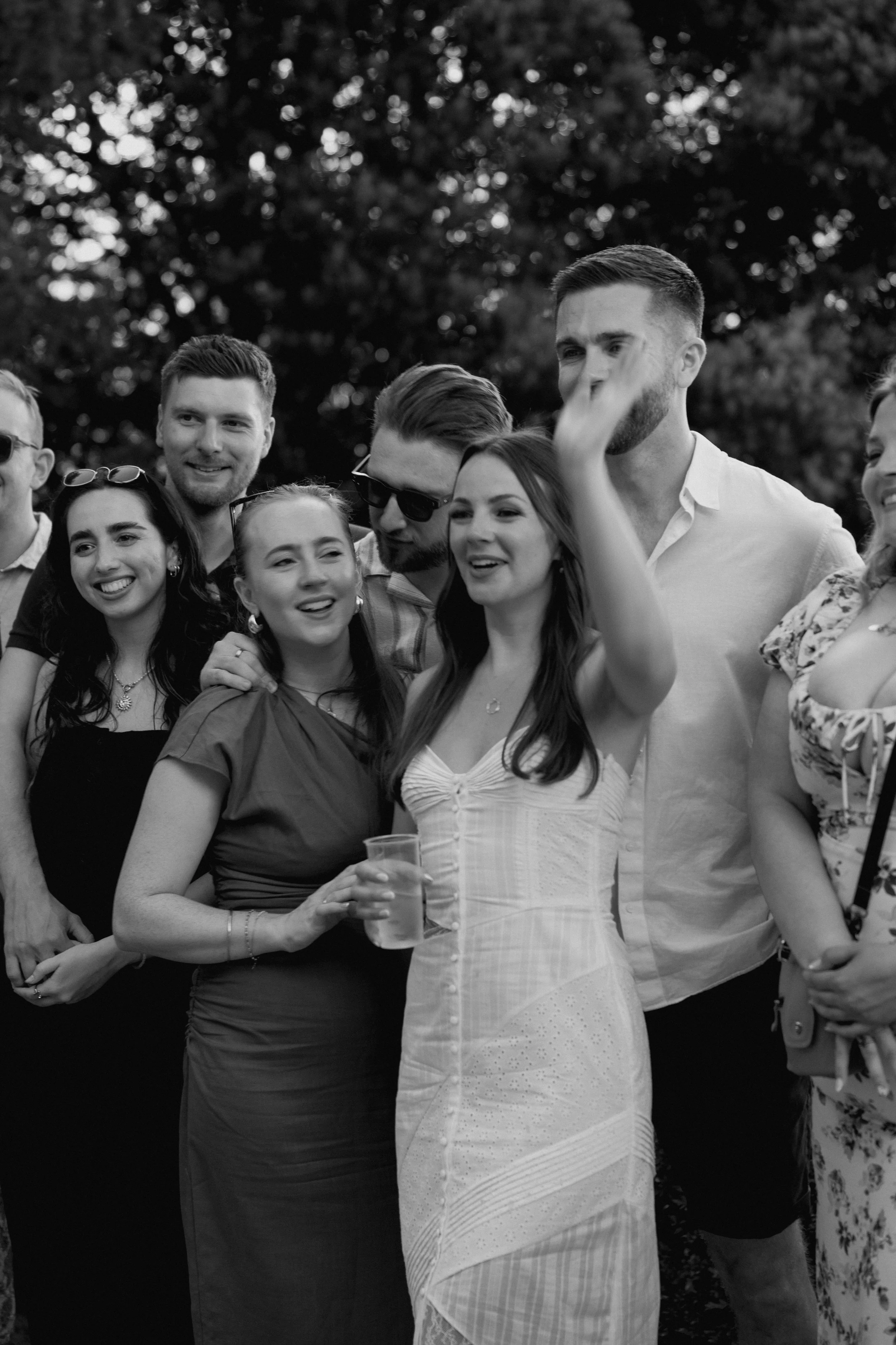 Bride and guests enjoying a pizza welcome party at Borgo di Pietrafitta in Tuscany, Italy