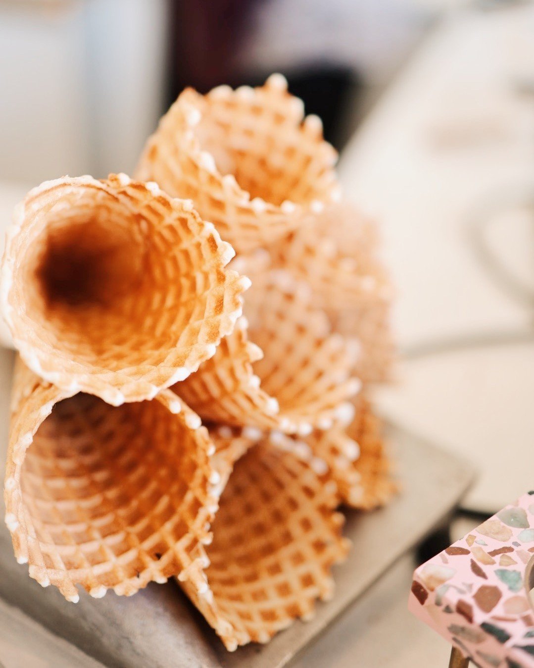 We take our waffle cones kinda seriously - using only a few simple ingredients mixed daily, we individually bake and roll them to crispy, buttery perfection. In the summertime we start early and roll all day long, and if you ask our shop team, most o