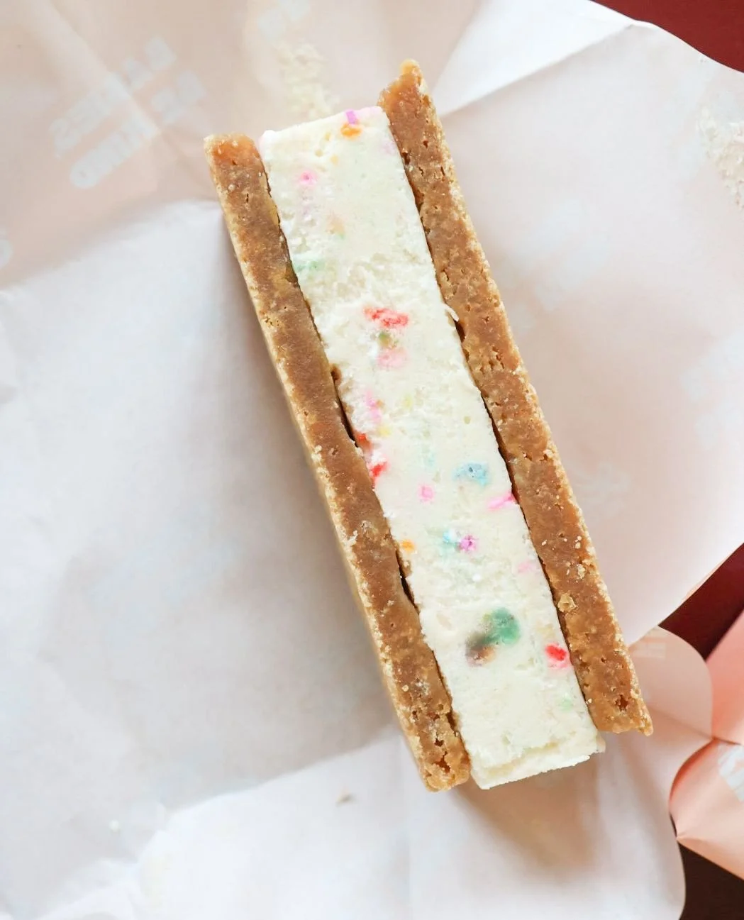 Birthday Cake Blondie ice cream sammies are made with our iconic cake-filled ice cream hugged tight by house-baked blondies. They drop every Thursday!