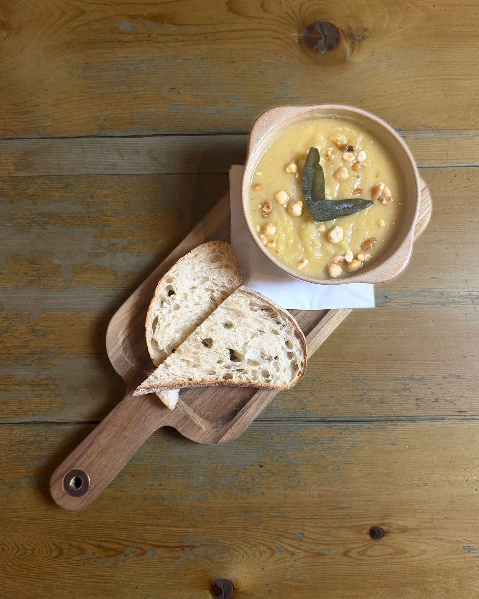 Celeriac &amp; sage soup, candied hazelnuts, sourdough (VE) 🥣

✨Menus &amp; Bookings: chequerscutnallgreen.co.uk