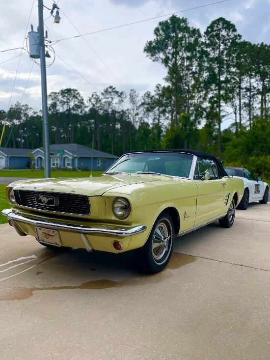 Classic yellow Mustang detailed with polishing and shine enhancement by Christal Clean in Palm Coast