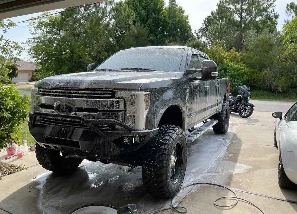 Truck with reflective paint under sunlight in Palm Coast, FL
