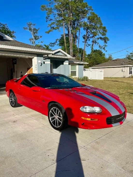 Red sports car after full detailing service with polishing and shine by Christal Clean in Palm Coast