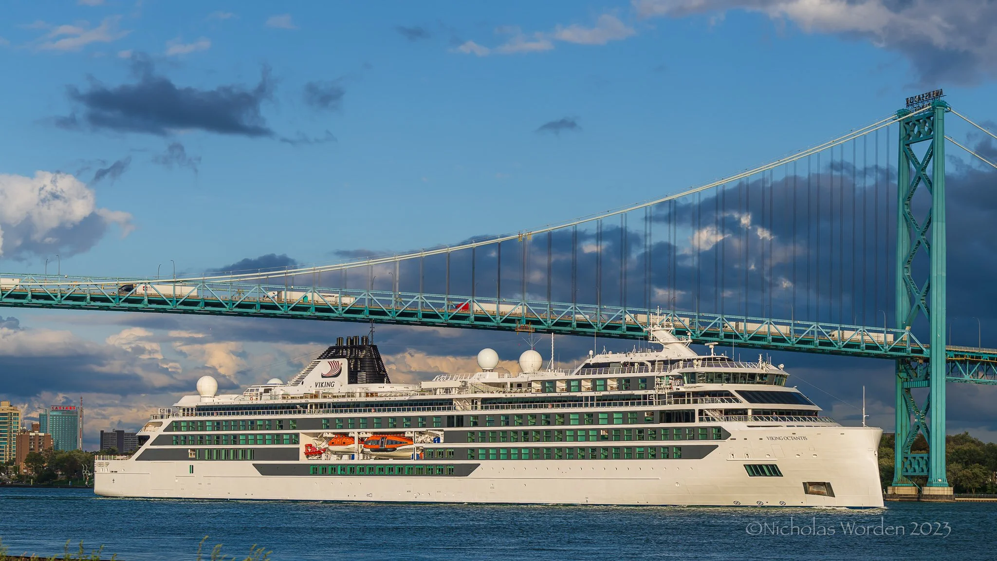 The Viking Octantis passes below the Ambassador Bridge.