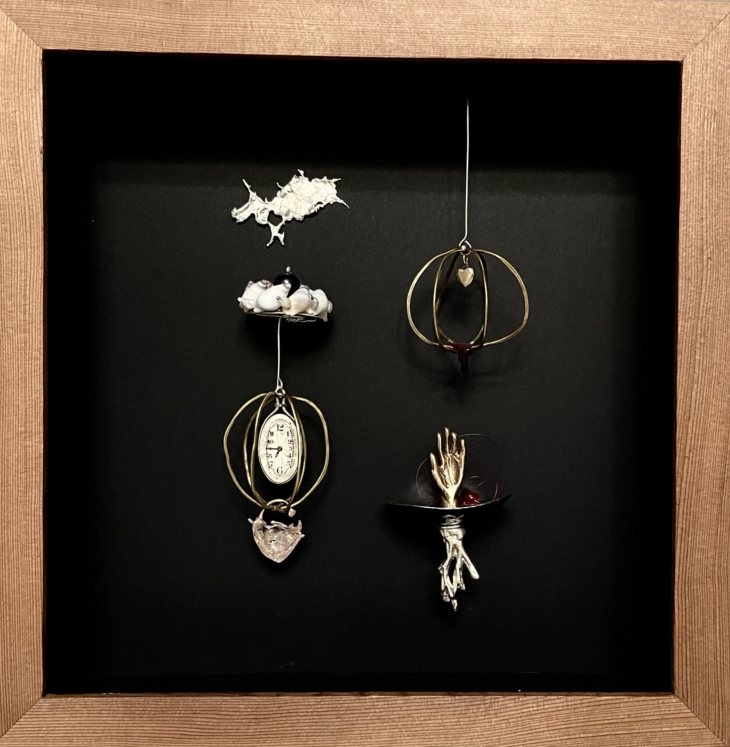 You broke my heart. 250mm x250mm x50mm
$1500
925 Sterling Silver, Antique watch, red wax,Antique hearts 9ct Gold, Copper, Shells, Lost wax technique Pink Bronze hand, Black Pearl.