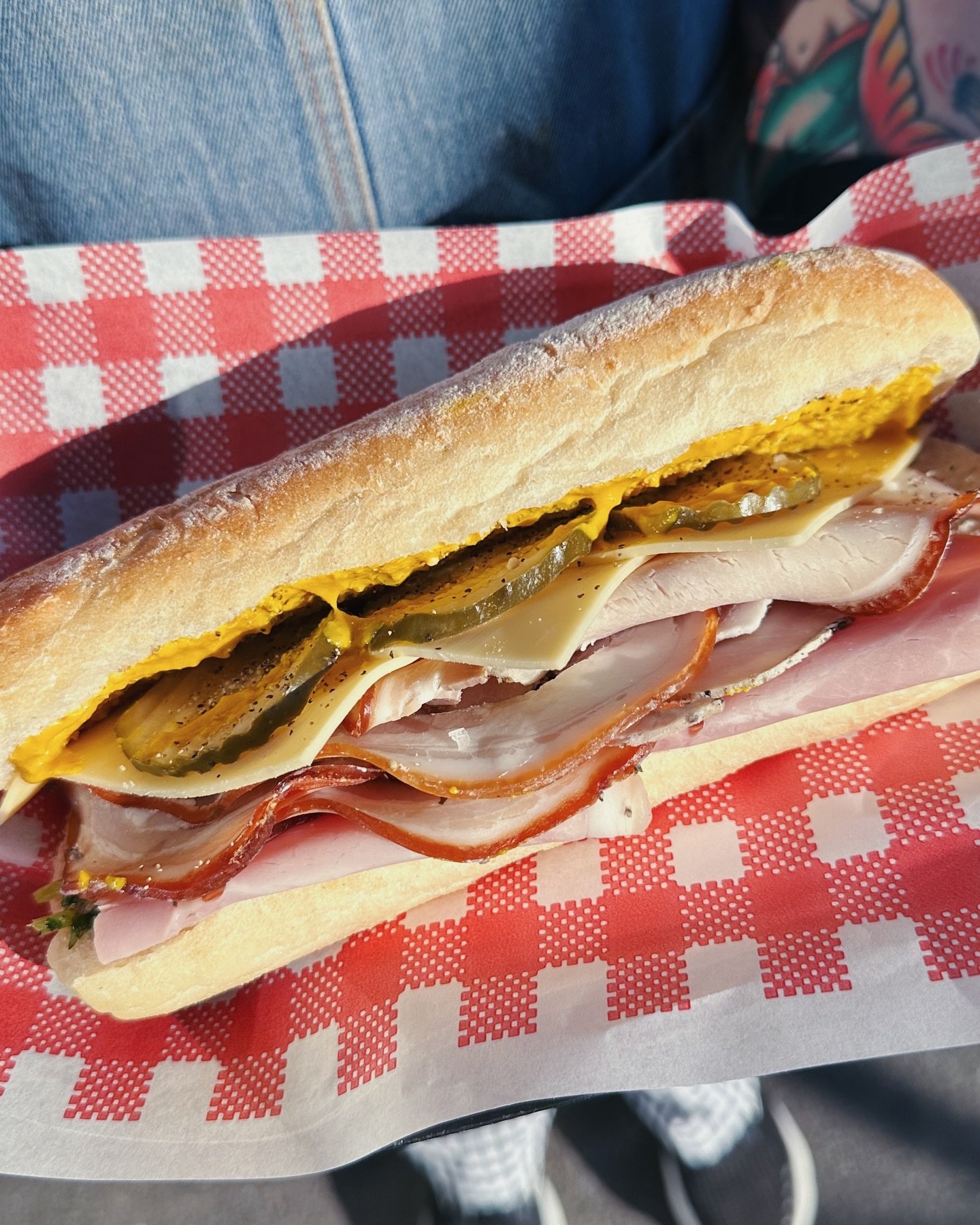 Our roll of the month for May is THE CUBANO 🥓 sliced roast pork and sliced ham with cheese, dill pickles, habanero mustard and our special mojo pesto, all on a @lamadrebakery long ciabatta. Every day until sold out!
