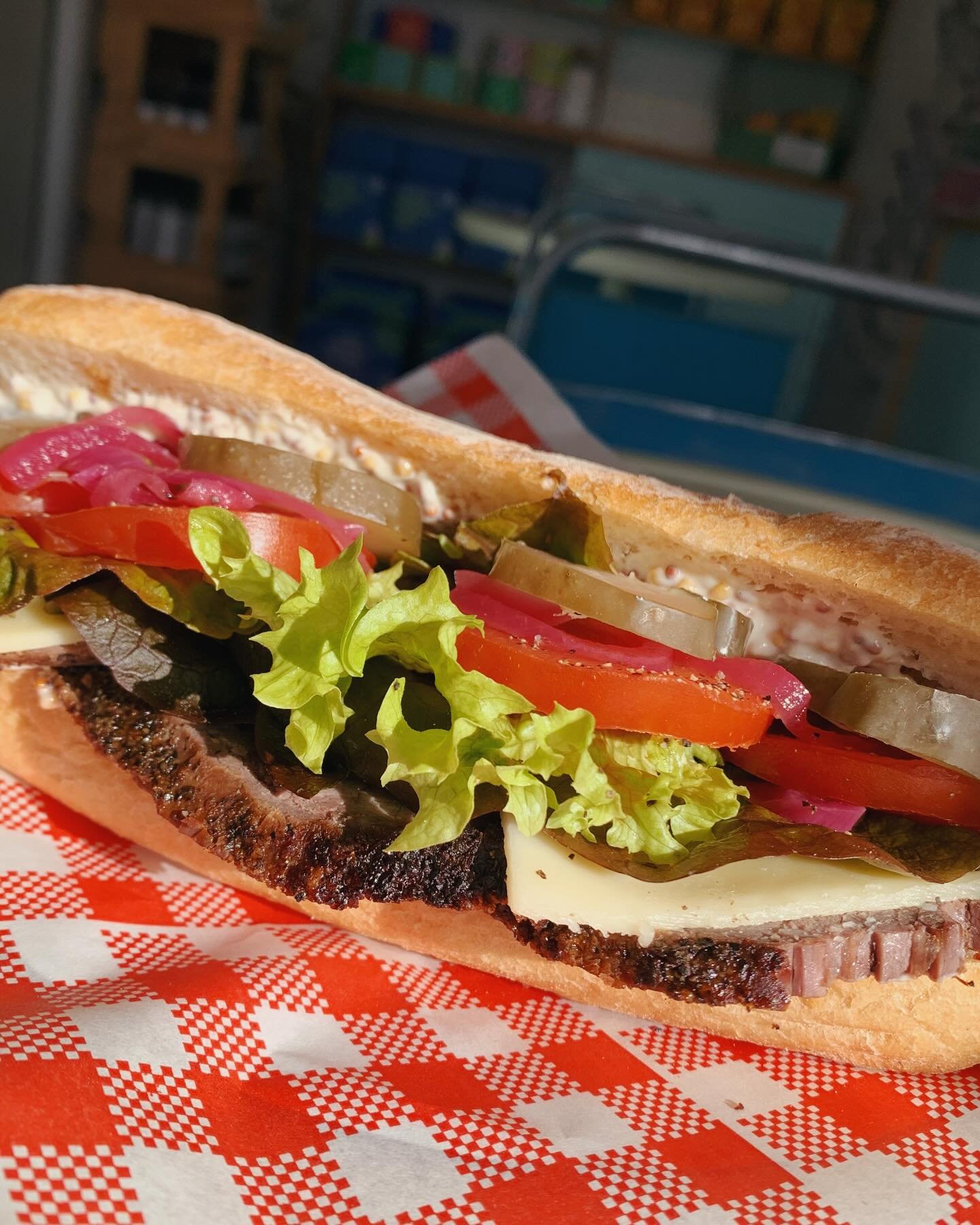 Our roll of the month for June is the ROAST BEEF 🥩 roast beef by us, Swiss cheese, tomato, lettuce, pickled onion, gherkins and seeded mustard mayonnaise on a @lamadrebakery ciabatta. Available every day until sold out!