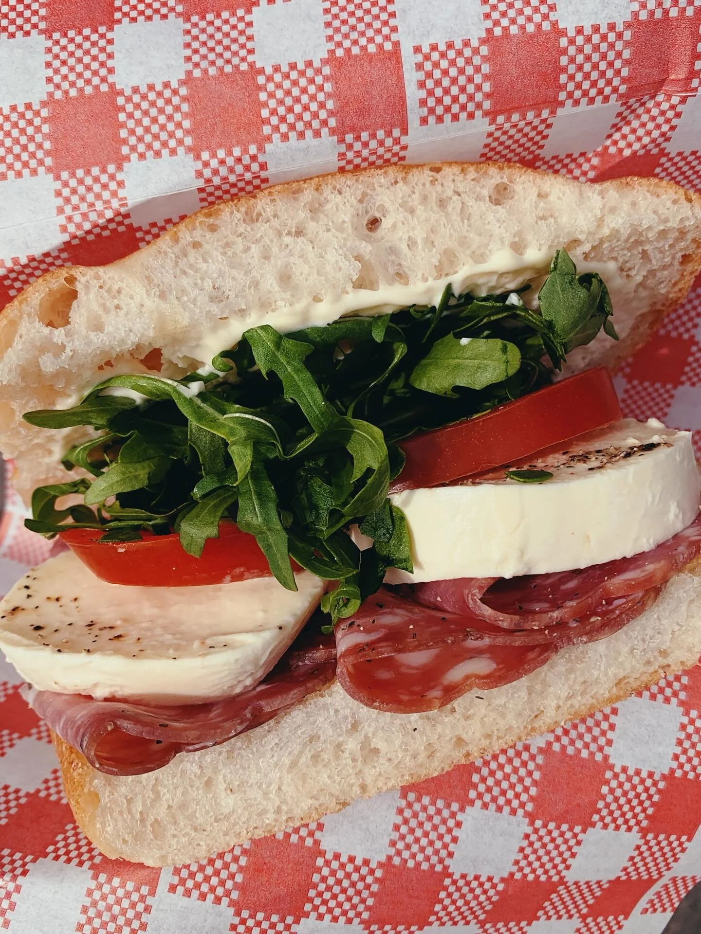 Our roll of the month for Sept is the HOT HONEY SALAMI 🍯 mild salami, hot honey made in-house with @bippi.foods chilli, rocket, tomato, fior di latte cheese and mayonnaise in a pillowy @lamadrebakery focaccia. Lovely fresh or toasted! Available ever