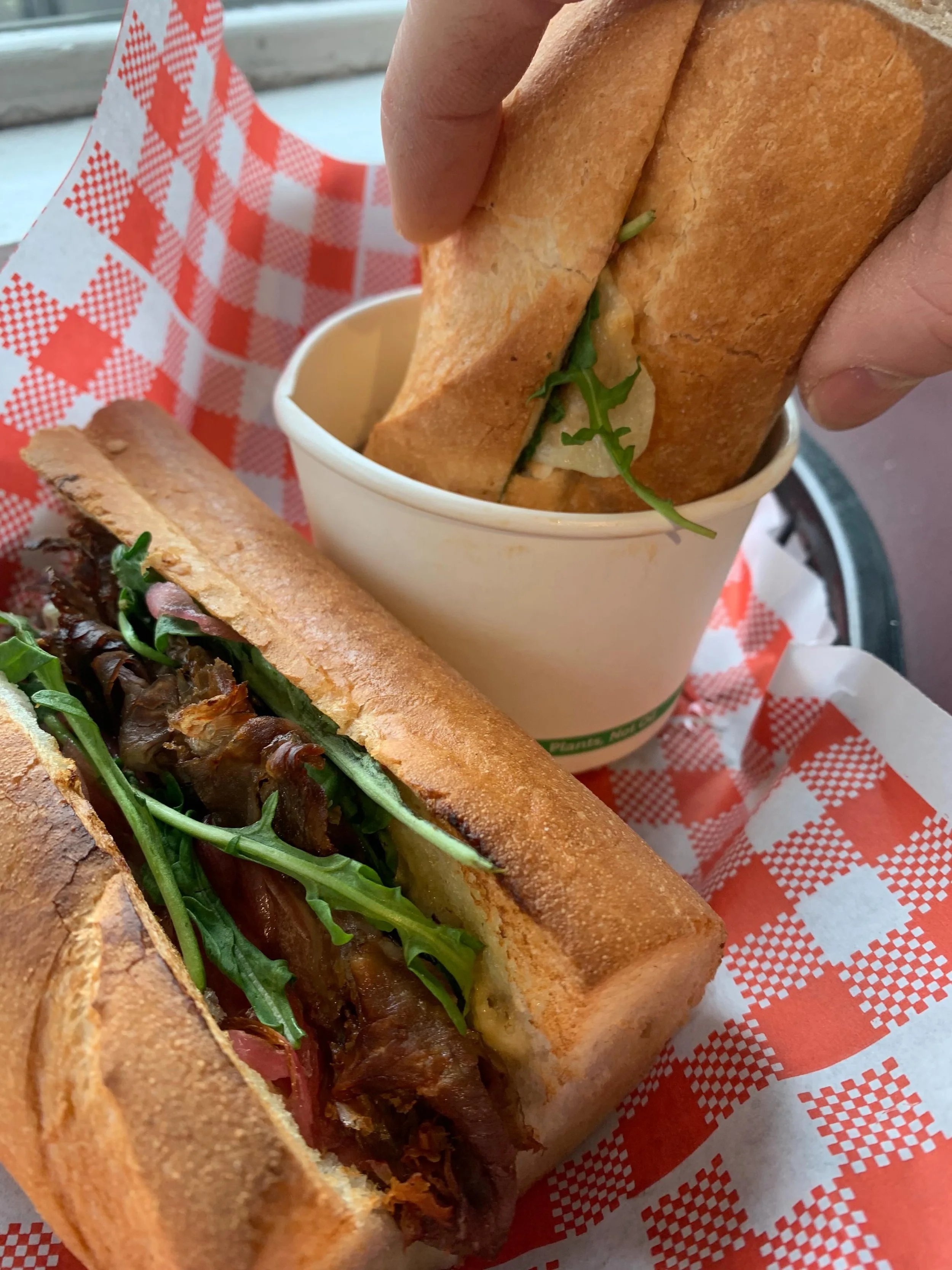 A blast from the past for July! THE BEEF DIP 🥩 shaved roast beef, pickled onion, Swiss cheese, rocket and dijonnaise in a @lamadrebakery baguette with hot beef jus on the side for dipping! Perfect for this wintery weather. Available every day until 