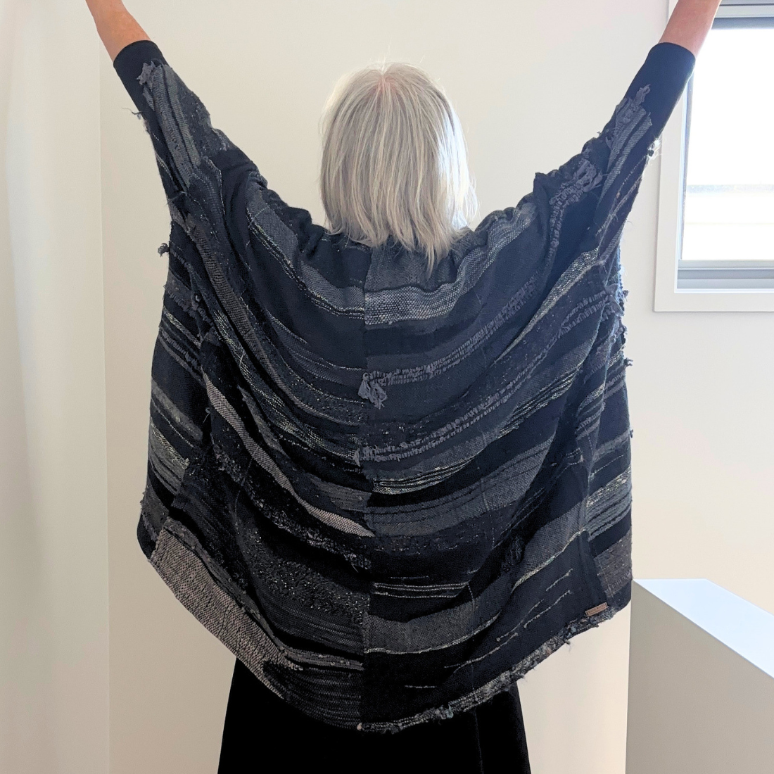black jacket back arms up.png