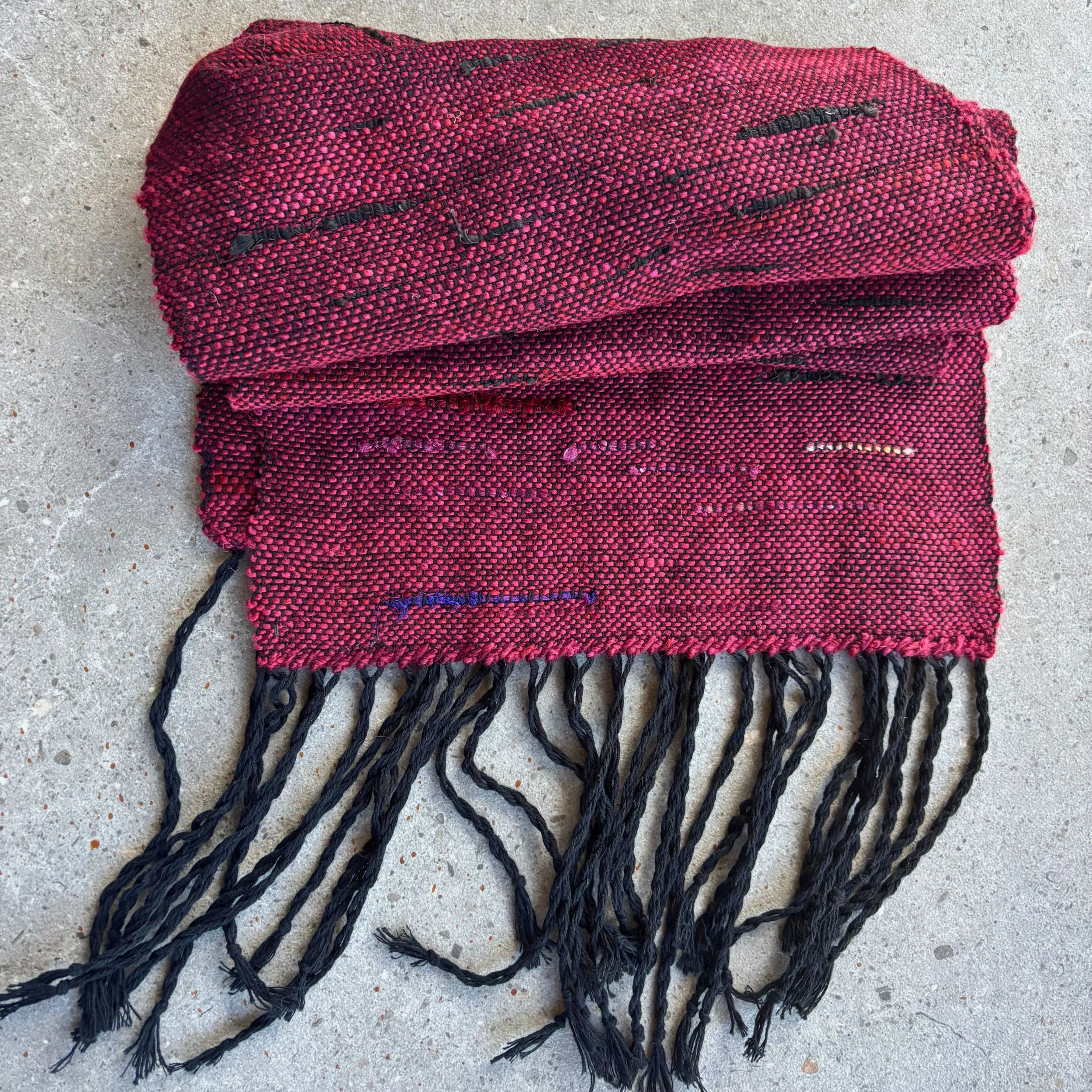 red scarf overhead concrete.jpg