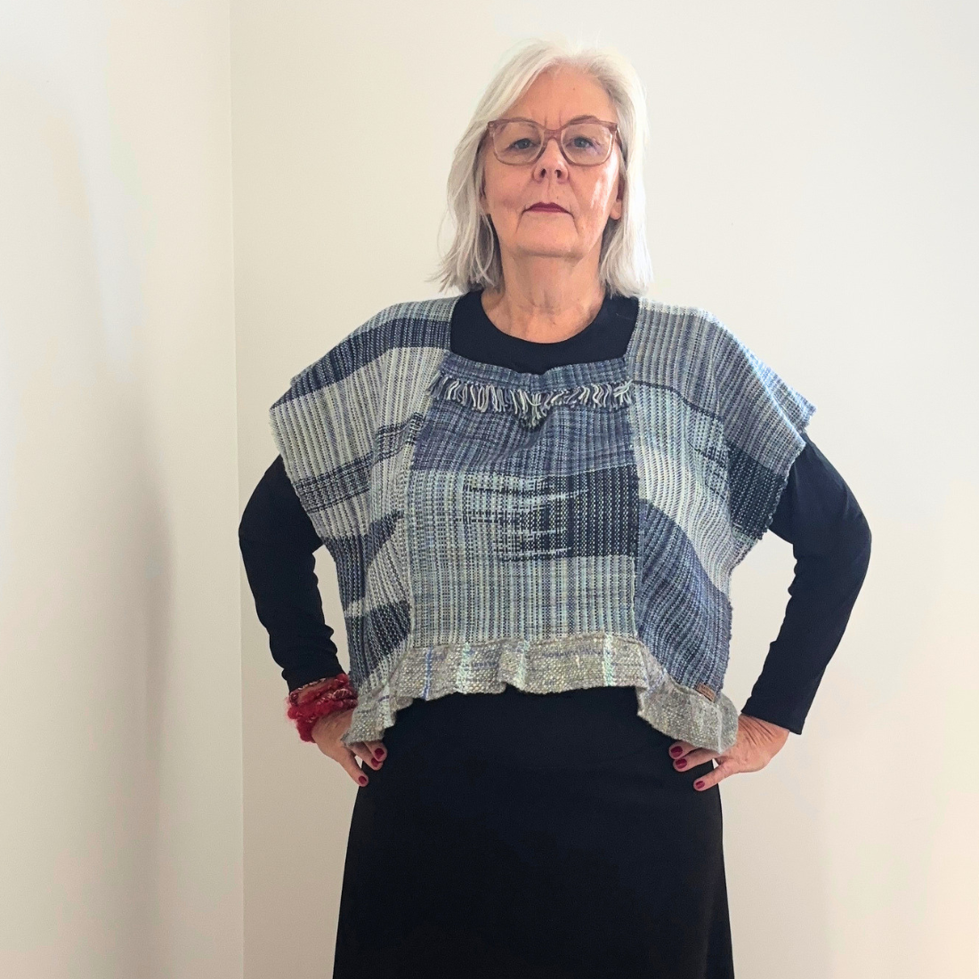 blue woven top front hands on hips.png