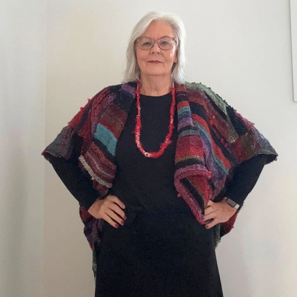 red green noro jacket front hands on hips.jpg
