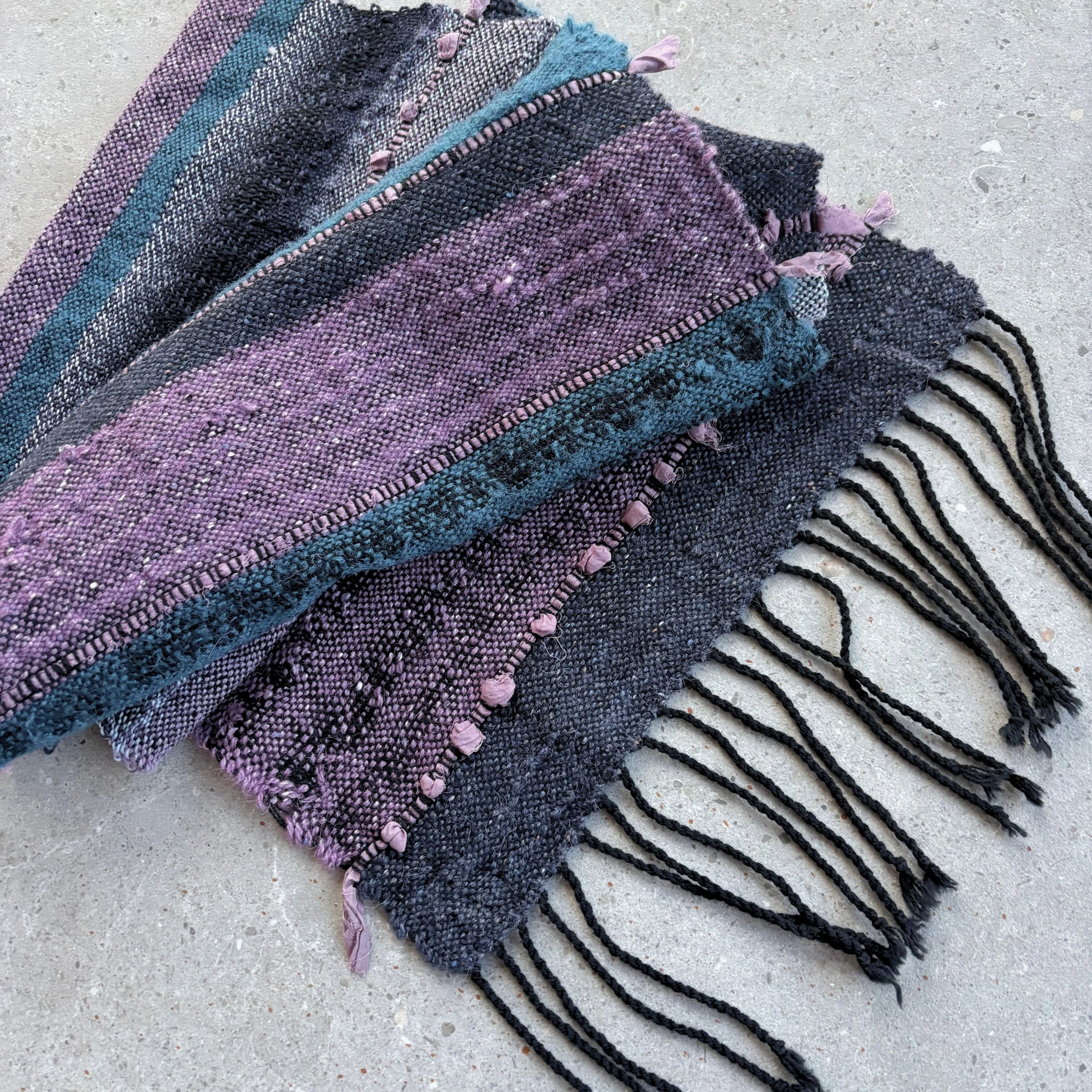 lavender and teal scarf folded concrete.jpg