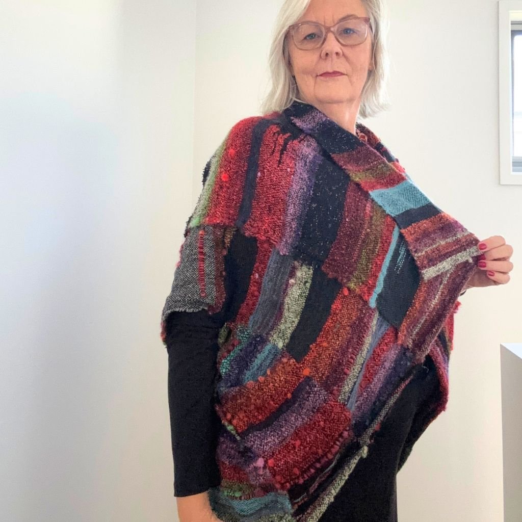 red green noro jacket holding front out.jpg