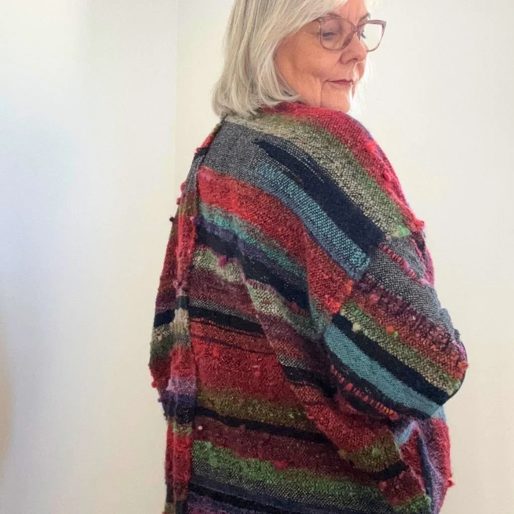 red green noro jacket over shoulder.jpg