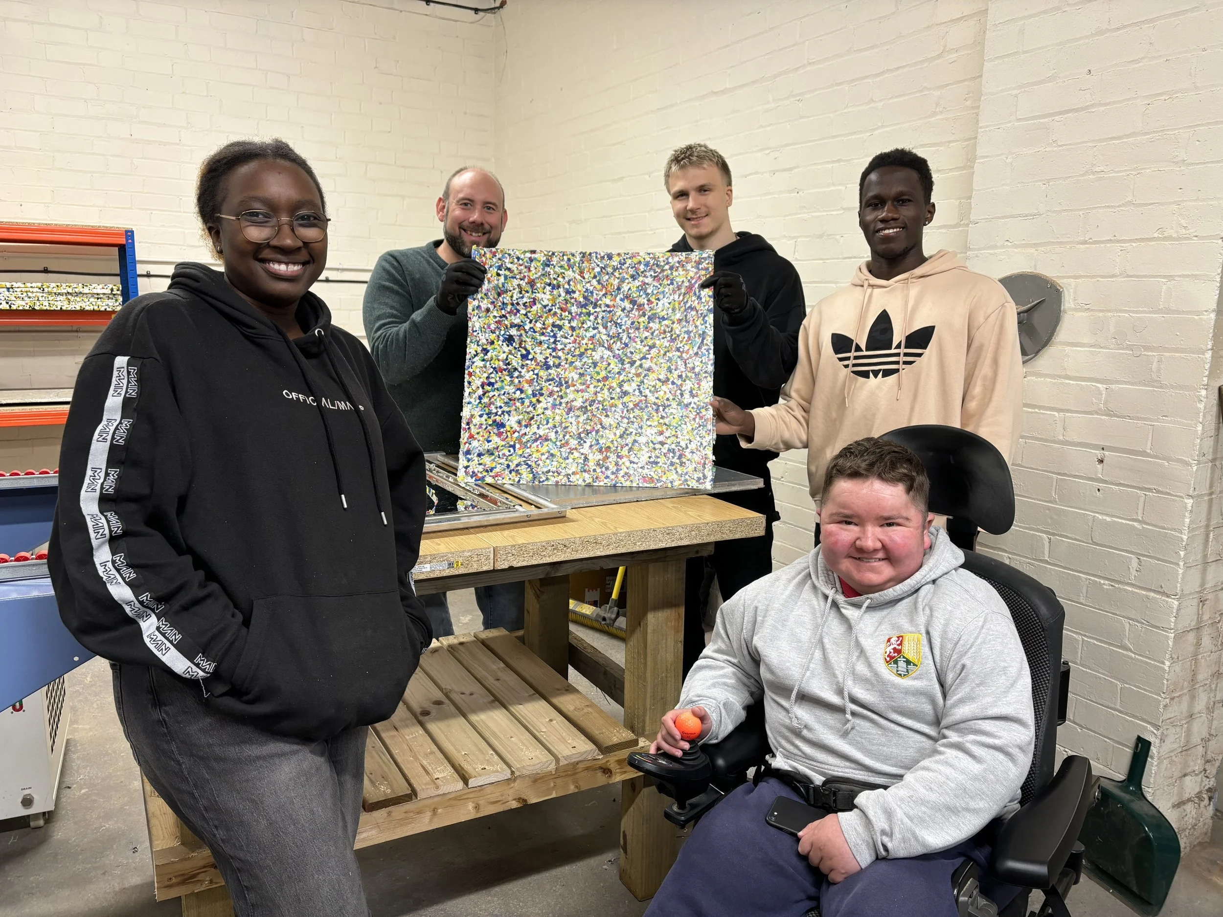 Compressed recycled plastic sheet