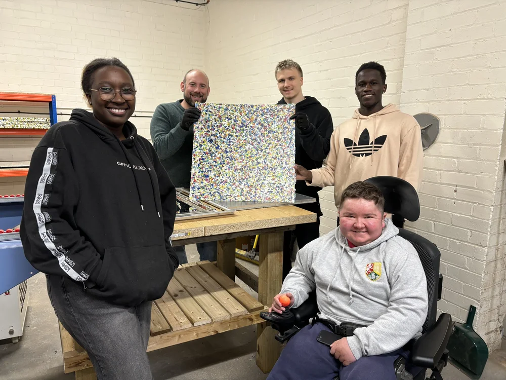 Compressed recycled plastic sheet