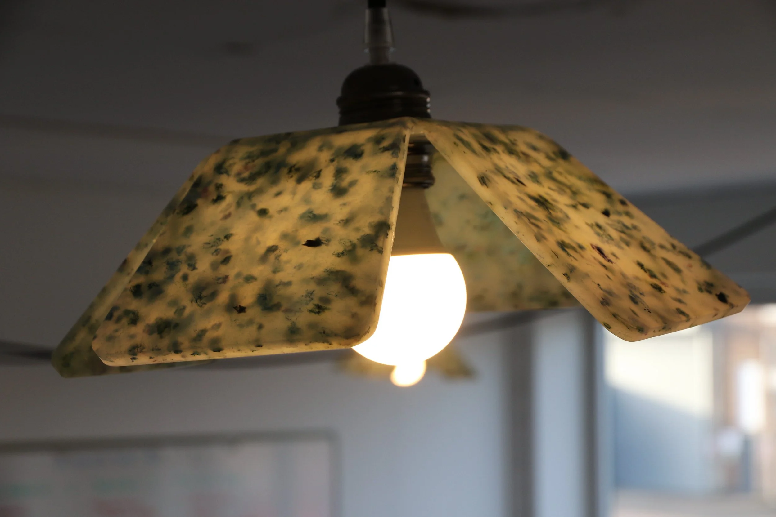 Close up of a grey recycled plastic light shade