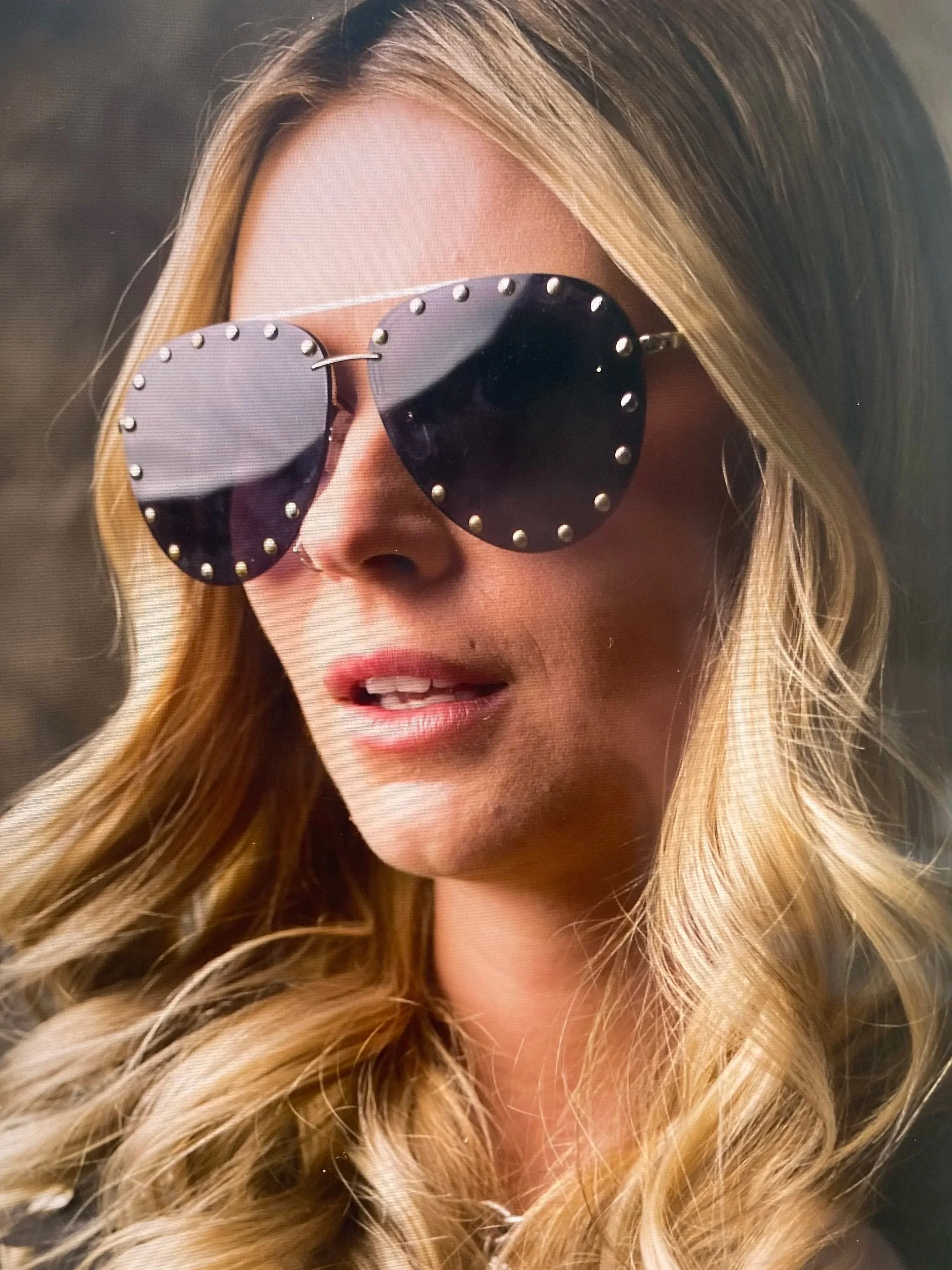 Teila wearing glasses