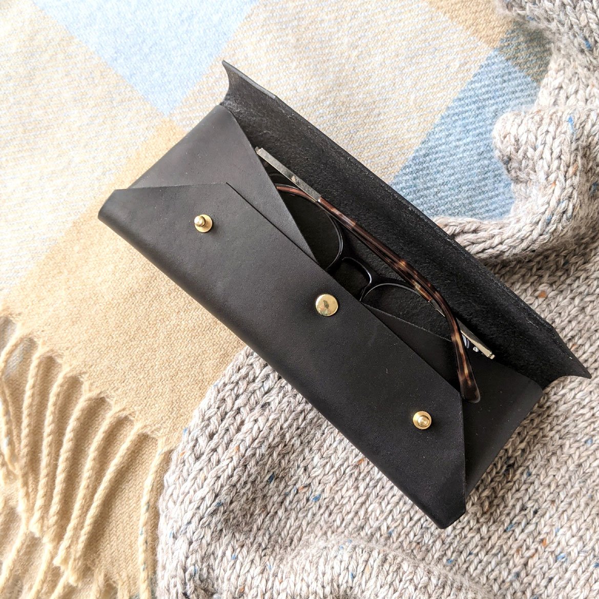 black-leather-glasses-case-with-double-buttons-open.jpg