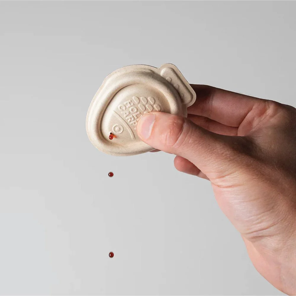 Holy Carp! — The world's first plastic-free, home compostable soy fish dropper.