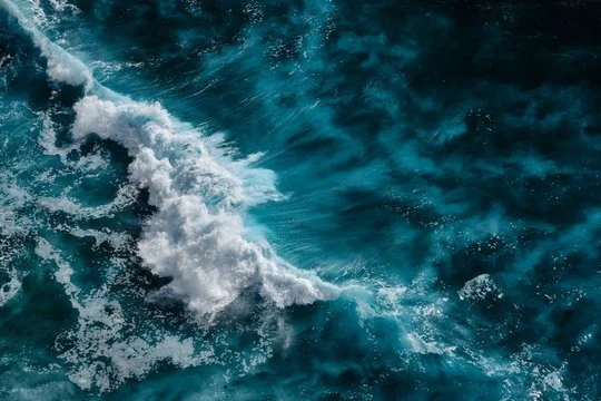Choppy ocean water with waves and white foam