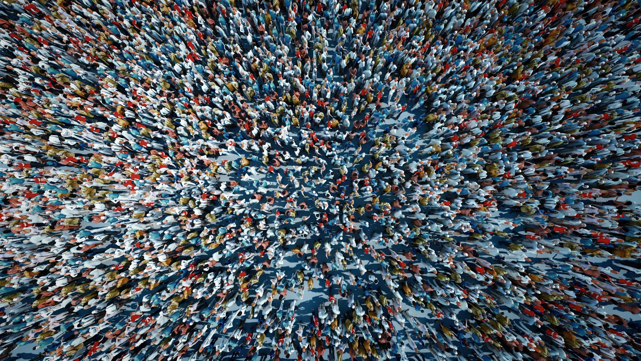 Aerial view of a large crowd of people walking on a city street.