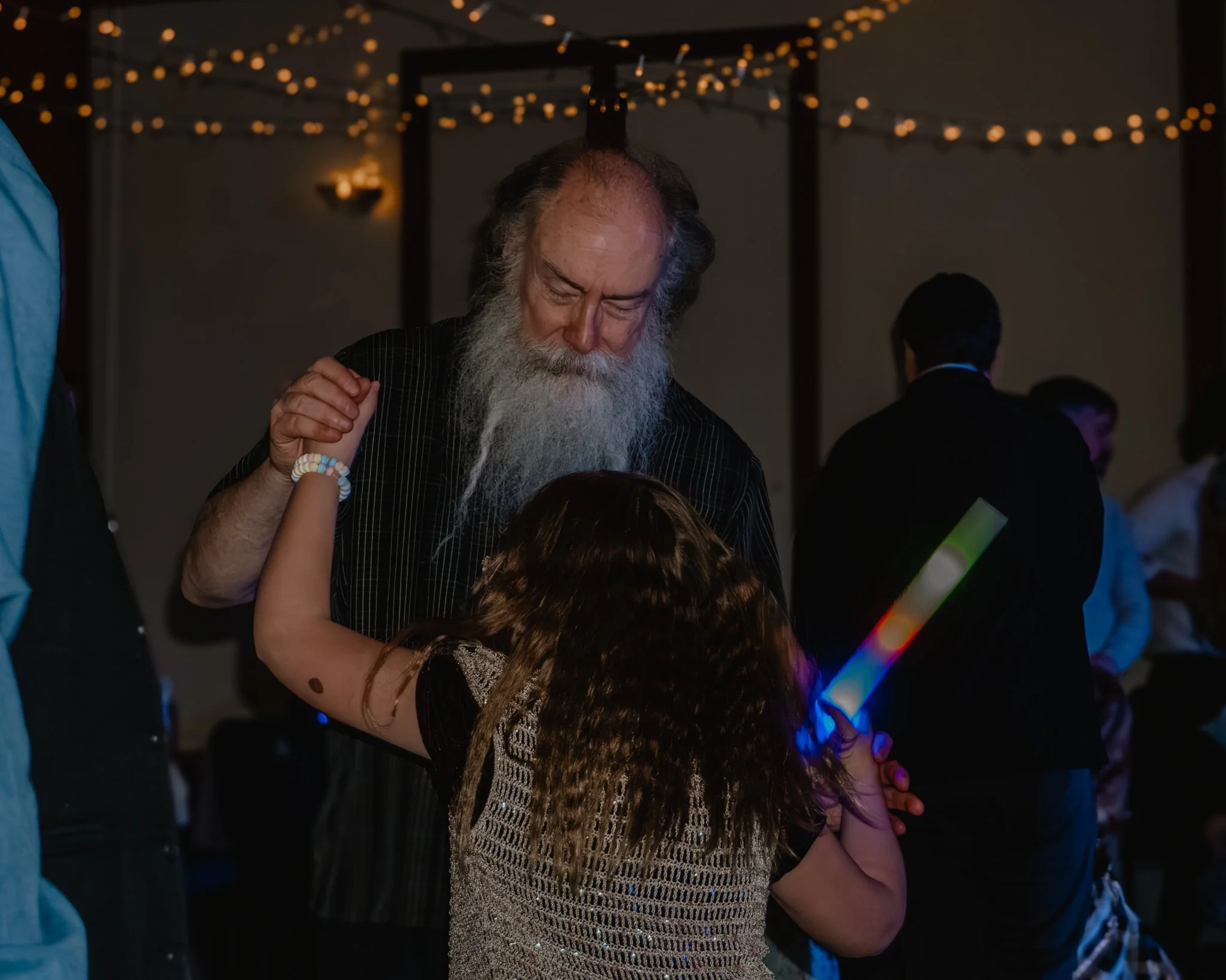 Grandfather dancing with his granddaughter during the Daddy Daughter Dance at Abundant Life Church in Wilmington Massachusetts.