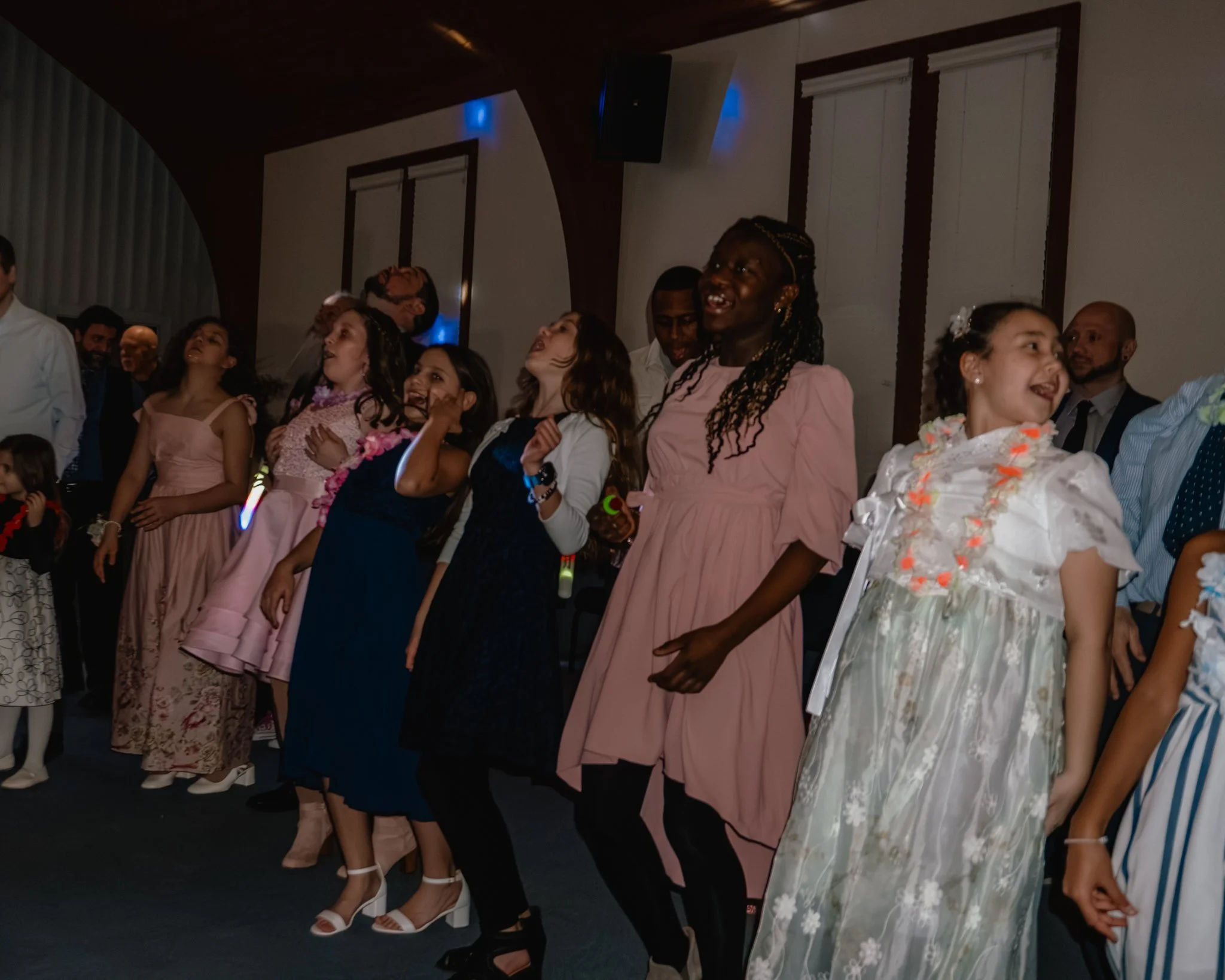 Girls participating in the Hokey Pokey during the Daddy Daughter Dance at Abundant Life Church in Wilmington MA.