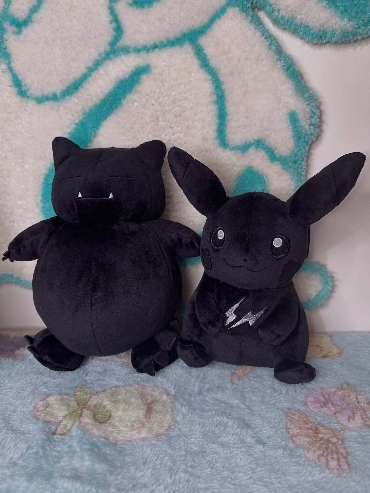 Two plushies from @tb_project, Pok&eacute;mon&rsquo;s collaboration with Fragment ⚡️ 
The all black designs are so sleek and I love how unique they are! I think they&rsquo;re very cute but everyone I show them to in person says they look a little sca