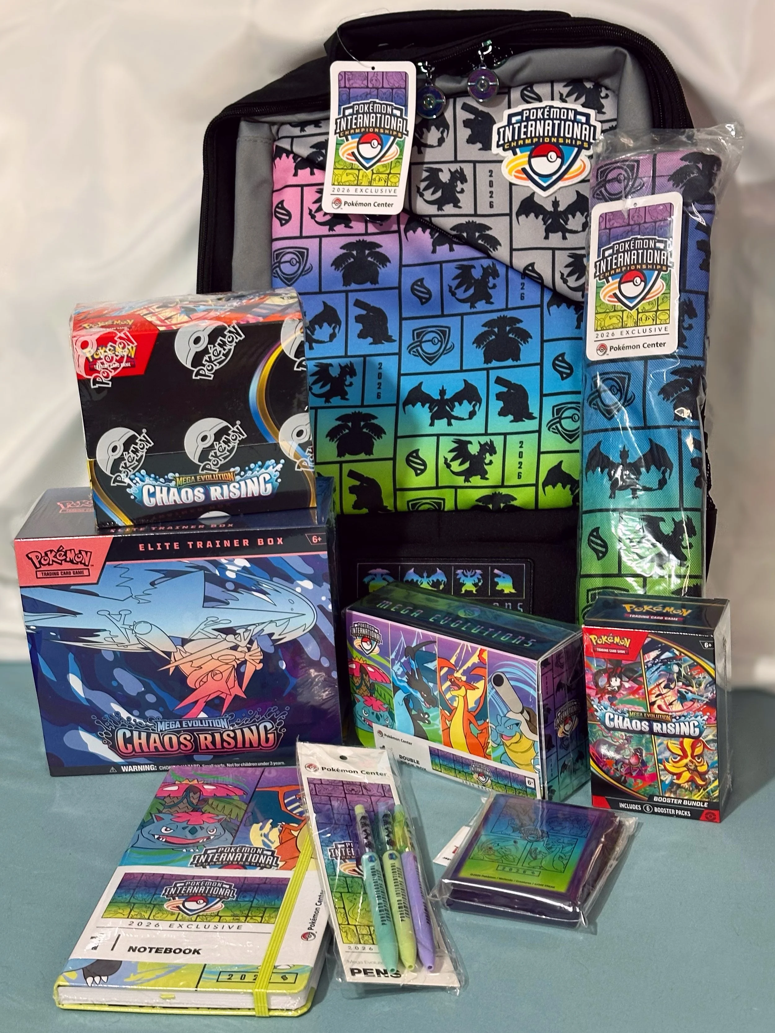Gearing up for Pok&eacute;mon NAIC and they were kind enough to send over this package filled with Mega Evolution themed goodies that are exclusive to this event&rsquo;s pop-up Pok&eacute;mon Center! 
Everything is super awesome but my favorites are 