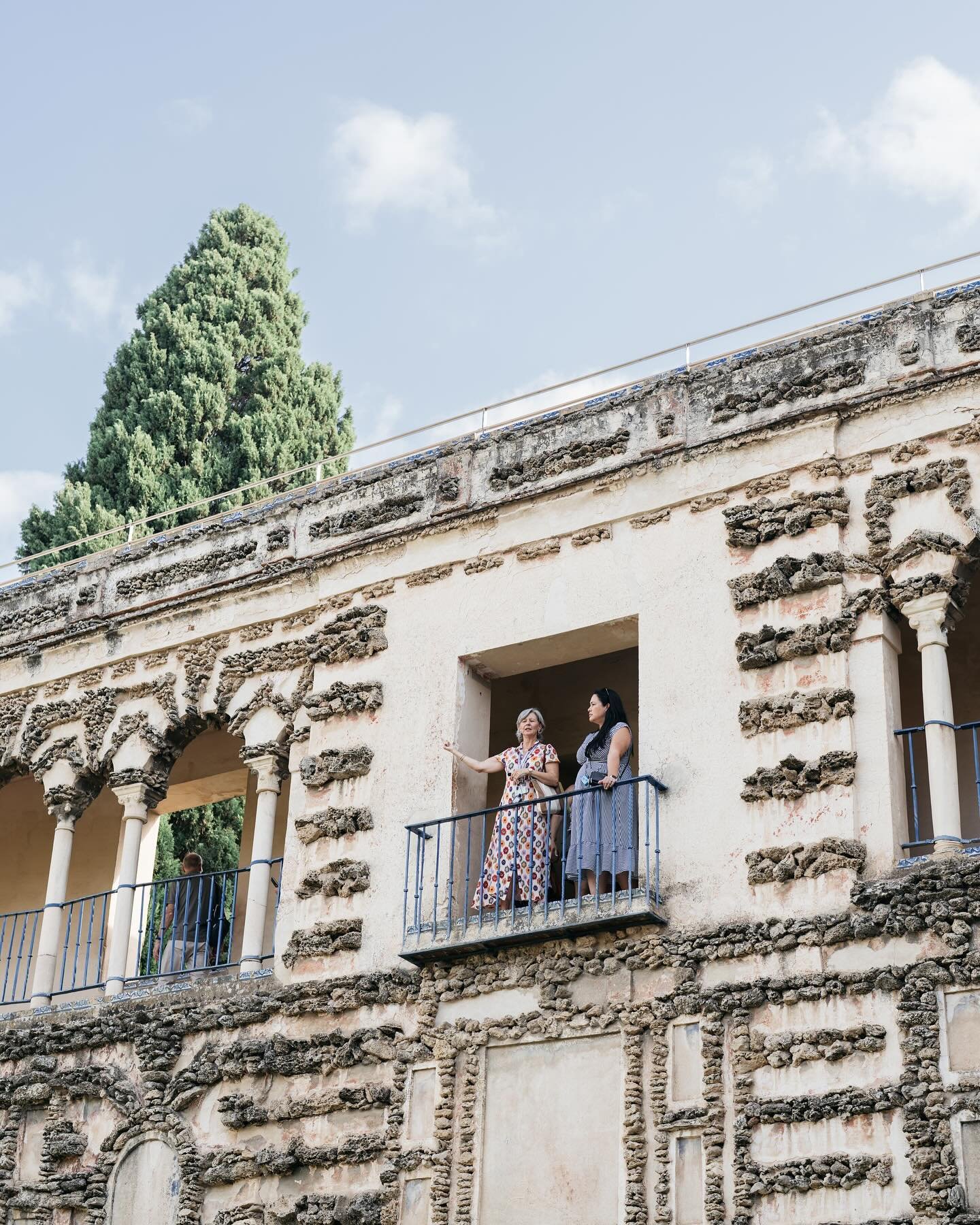 Day 1: Arriving at our amazing villa, which was once a palace to King Alfonso, we were greeted with cava and a guitarist playing Spanish music. 

We stayed across the street from the most beautiful Parque de Maria Luisa, where the Plaza de Espana is 