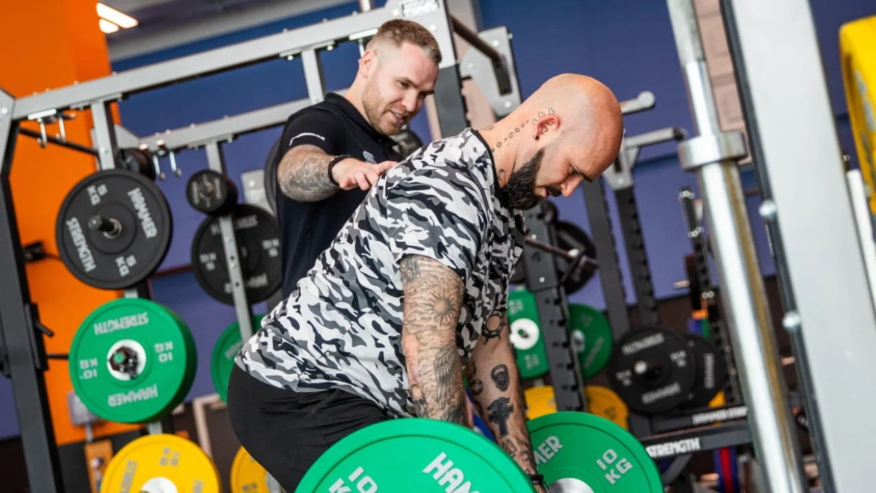 Personal Training Edinburgh- PT Spotting Client Bent Over Rows